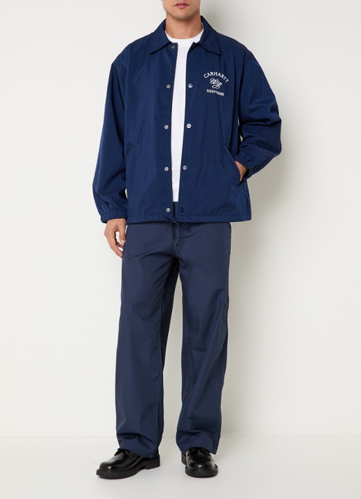 Carhartt WIP Eightynine Coach softshell jack met steekzakken - voorkant 4 indigo