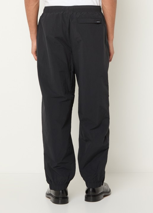 Carhartt WIP Tapered fit trackpants met logo en steekzakken - achterkant 5 zwart