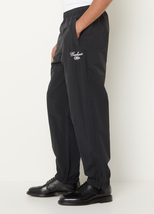 Carhartt WIP Tapered fit trackpants met logo en steekzakken - detail 4 zwart