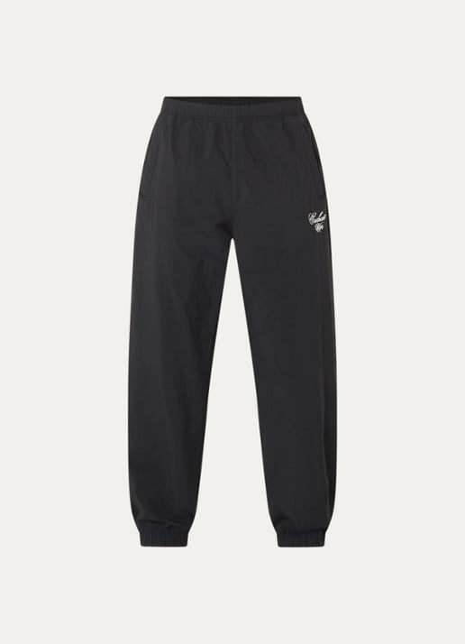 Carhartt WIP Tapered fit trackpants met logo en steekzakken - voorkant zwart