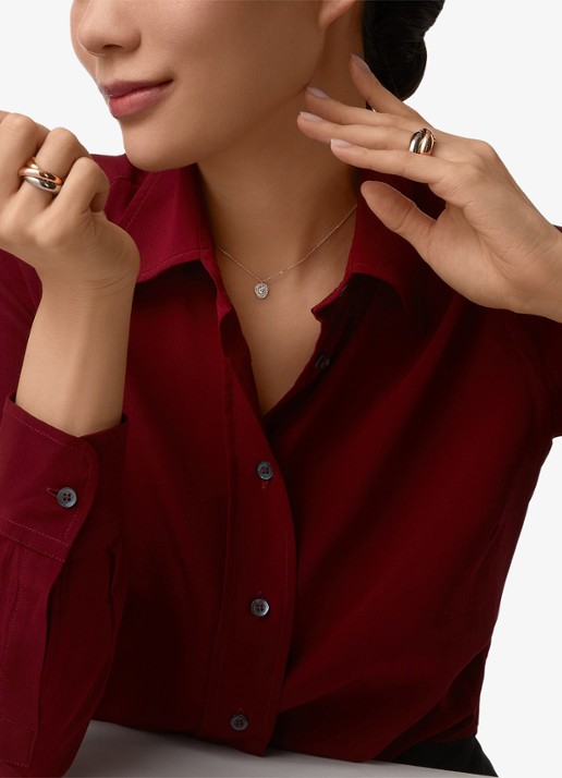 Cartier Trinity de Cartier ketting van 18 karaat rosé-, wit,- en geelgoud met 0.29 ct diamant CRB7224807 - achterkant 6 goud