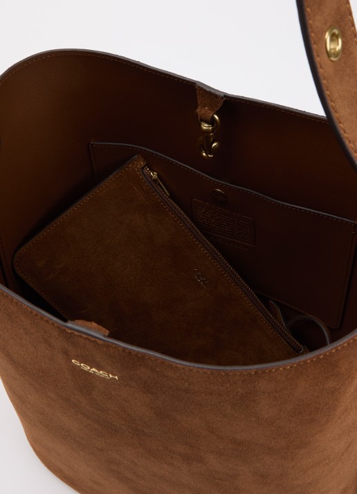 Coach Bleecker Bucket schoudertas van suède met uitneembare etui - detail 5 roestbruin