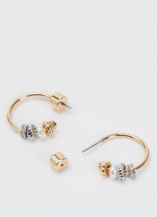 Coach Rondelle oorstekers met kristal - detail goud