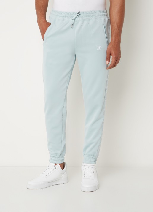 Daily Paper Etape tapered fit cropped trackpants met ritszakken en logoband - detail mint