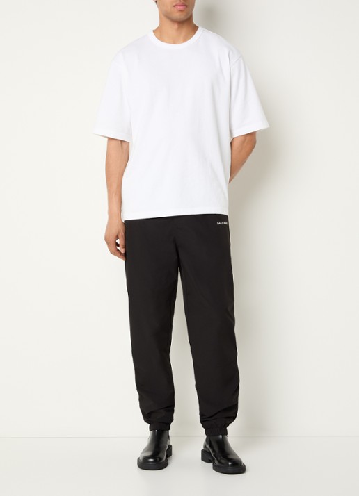 Daily Paper Eward tapered fit trackpants met logo en steekzakken - voorkant 3 zwart