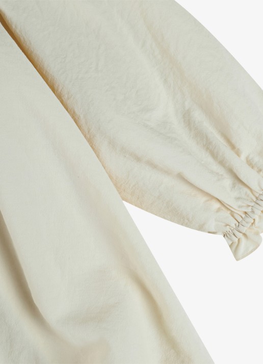 Donsje Amsterdam Nyari jurk met plooien - detail 5 creme