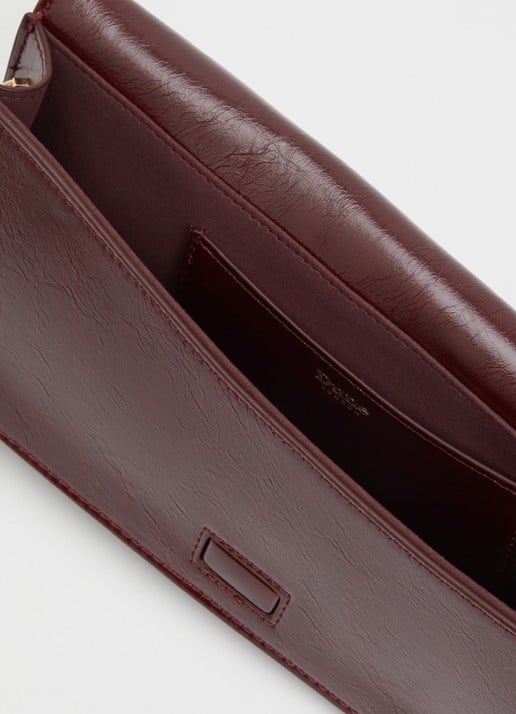 Dune London East To West Long clutch met crocostructuur - detail 2 bordeauxrood