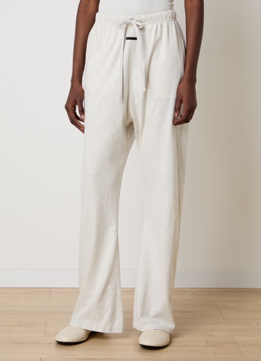 Fear of God Essentials High waist flared fit broek met steekzakken