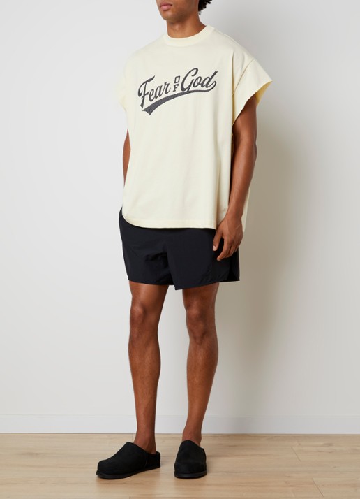 Fear of God Essentials T-shirt met front- en backprint - voorkant 3 lichtgeel