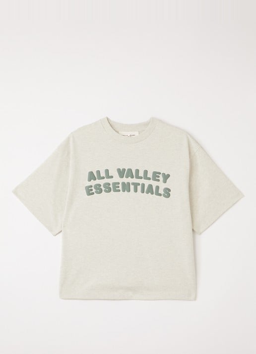 Fear of God Essentials T-shirt met front- en backprint - voorkant vanillegeel