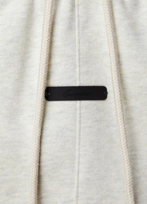 Fear of God Essentials Tapered fit joggingsbroek met steekzakken - detail 6 gebroken wit
