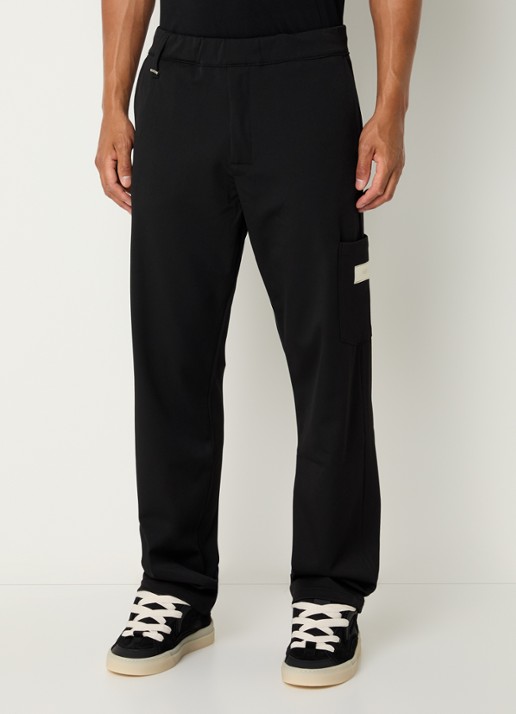 FLÂNEUR Atelier loose fit pantalon met opgestikte zak - detail zwart