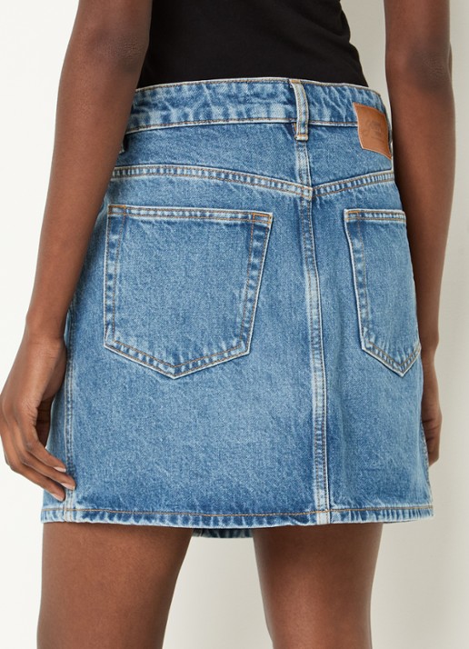 Ganni Mini spijkerrok met steekzakken - achterkant indigo