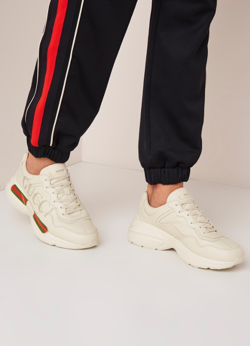 Gucci Rhyton sneaker van leer  - voorkant 2 gebroken wit
