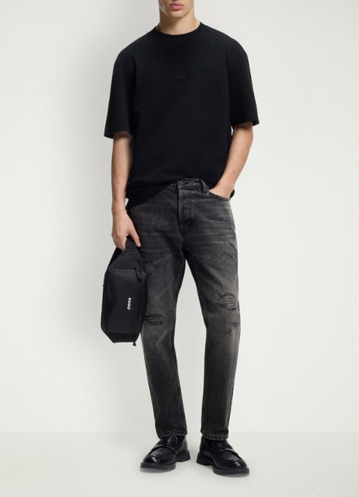 HUGO Slim fit jeans met gekleurde wassing - voorkant 2 zwart