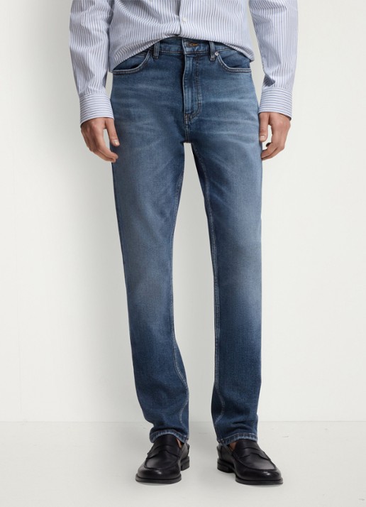 HUGO Slim fit jeans met steekzakken - detail 3 middenblauw
