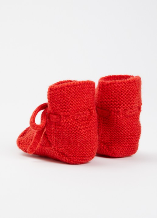 Hvid Babyslofjes van merino wol - achterkant rood