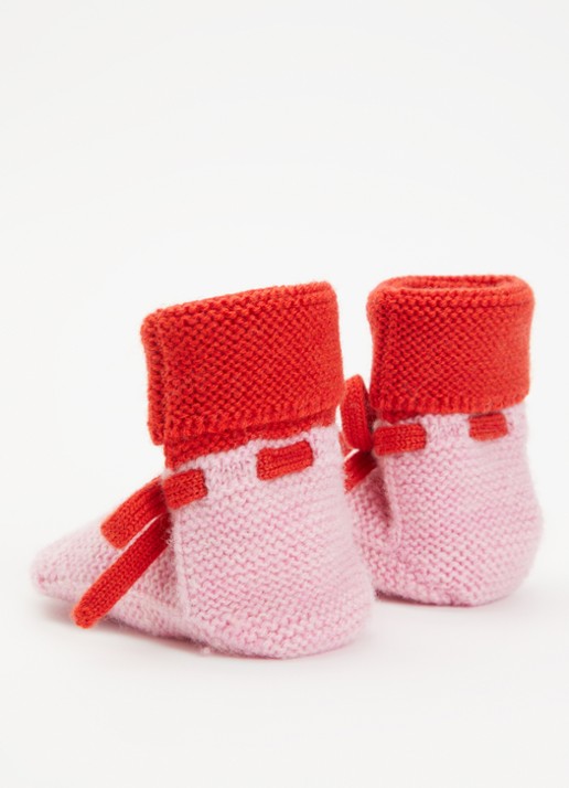 Hvid Babyslofjes van merino wol  - achterkant roze