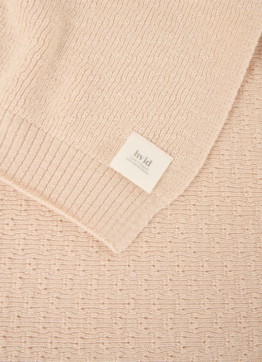 Hvid Dora wiegdeken van merino wol 95 x75 cm - detail creme