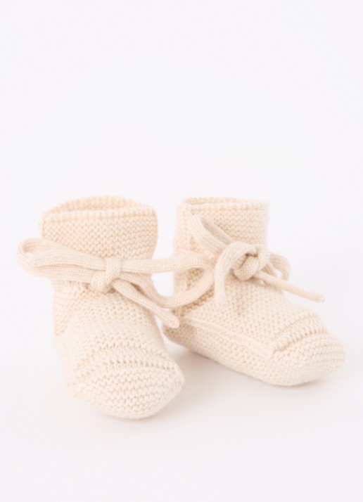 Hvid Gebreide babyslofjes van wol - voorkant gebroken wit