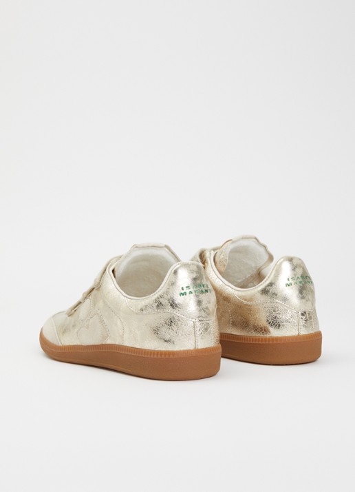 Isabel Marant Beth sneaker van schapenleer met metallic finish - achterkant goud