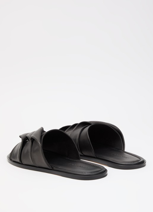 J.W. Anderson Coil slipper van leer - achterkant zwart