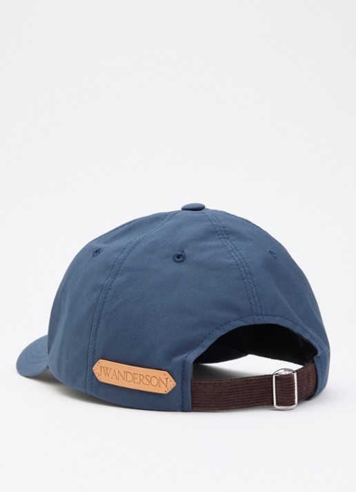 J.W. Anderson Pet met logoborduring en details van kalfsleer - detail petrol
