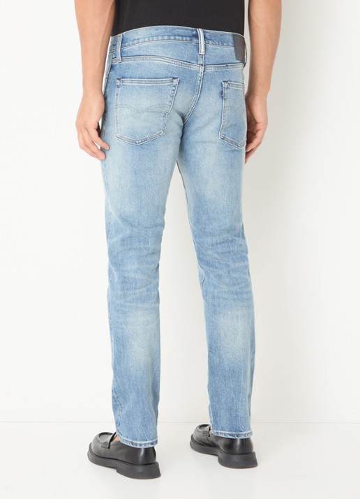 Levi's 511 slim fit jeans met medium wassing en steekzakken - achterkant indigo