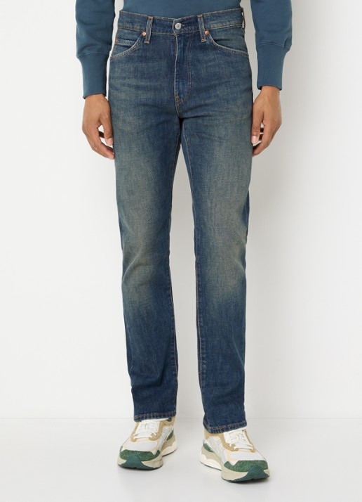 Levi's 518 slim fit jeans met medium wassing