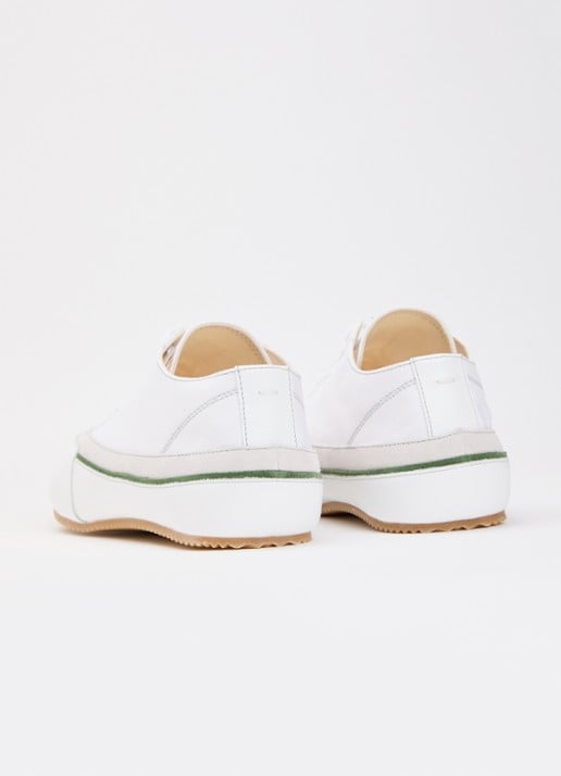 Maison Margiela Traveler sneaker van canvas met kalfsleren details - achterkant 2 gebroken wit