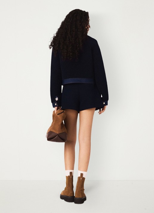 Maje Jack van bouclé  met details van denim - achterkant donkerblauw
