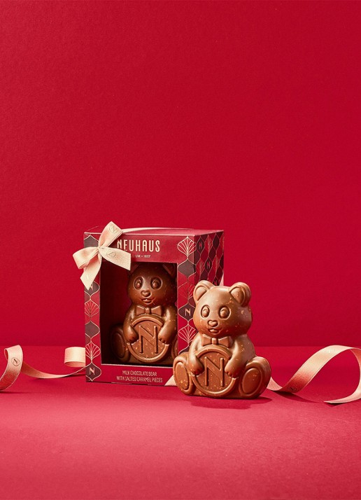 Neuhaus Bear melk chocoladereep met maïs - achterkant beige