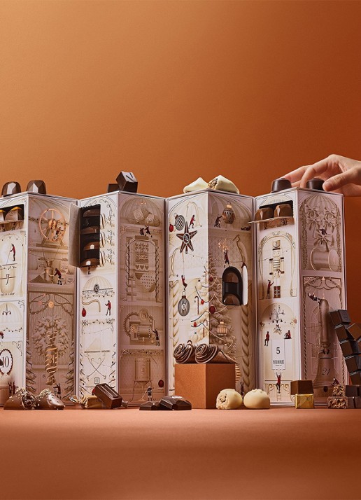 Neuhaus Sharing adventskalender met chocolade - 25 dagen - achterkant 2 beige