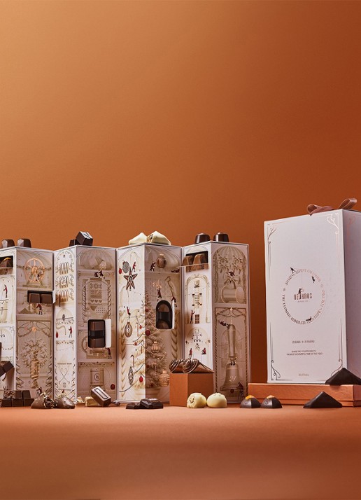 Neuhaus Sharing adventskalender met chocolade - 25 dagen - detail beige