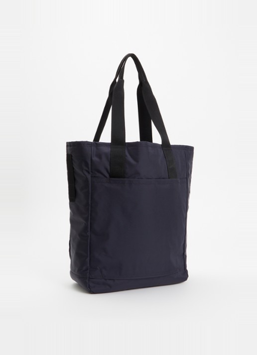 New Balance NB Go schoudertas met 14 inch laptopvak - achterkant donkerblauw