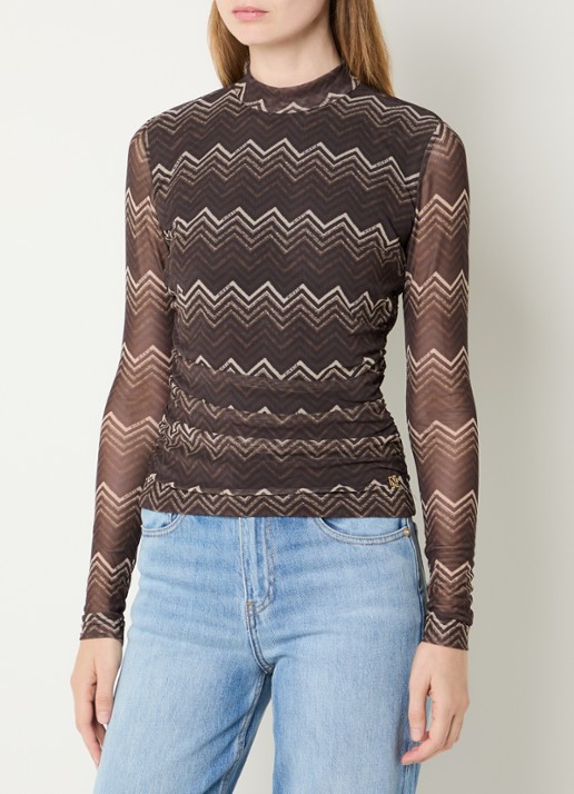 NIKKIE Ariva semi-transparante top van mesh met ruches en print