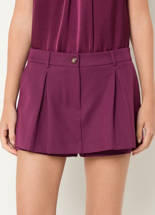 NIKKIE Ashira mini rok met plooidetail