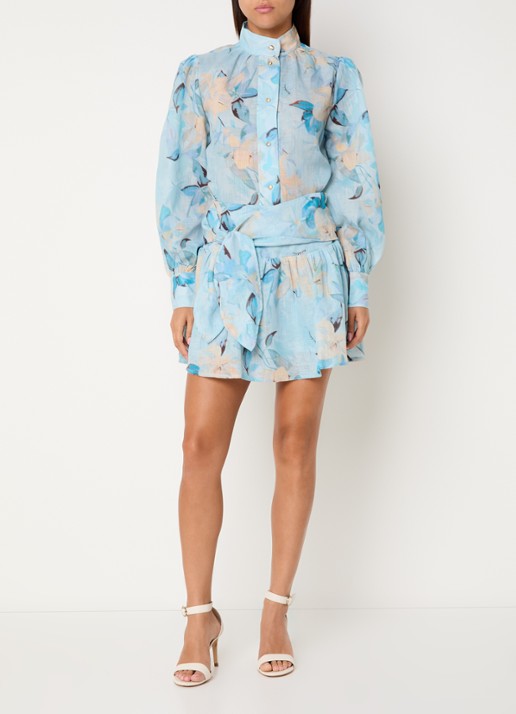NIKKIE Avalon semi-transparante blouse met bloemprint  - voorkant 2 lichtblauw