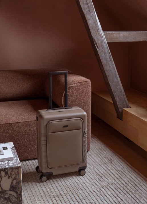 Nortvi Spinner met laptopvak 55 cm - voorkant 2 clay / taupe