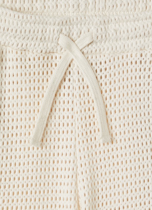 OAS Braga zwemshorts met opengewerkt dessin - detail beige