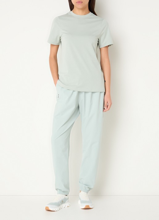 On Focus high waist tapered fit trackpants met steekzakken - voorkant 2 lindegroen