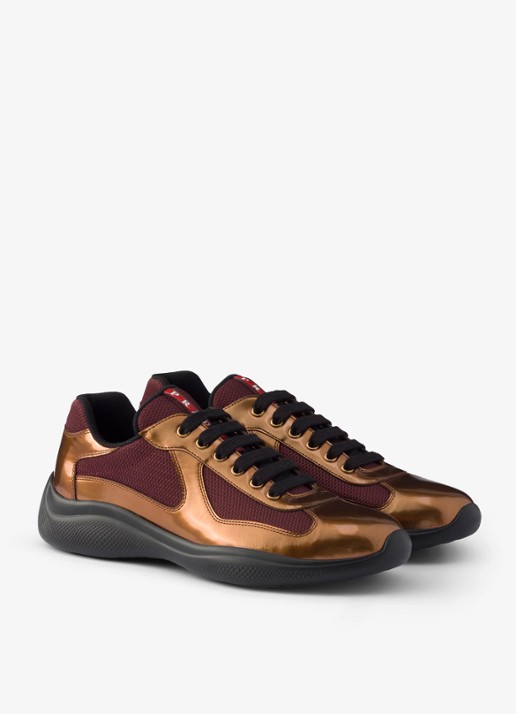 Prada America's Cup sneaker van mesh met metallic finish - voorkant 2 goud