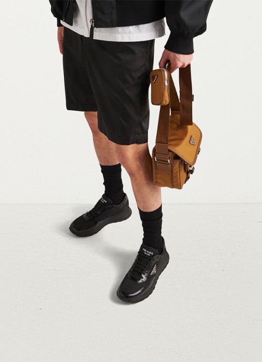 Prada Prax 01 Re-Nylon sneakers met leren details en logo - achterkant 8 zwart
