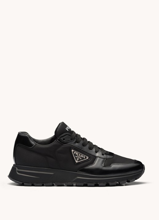 Prada Prax 01 Re-Nylon sneakers met leren details en logo - voorkant 2 zwart