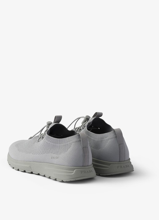 Prada Prax sneaker met gebreid bovenwerk - achterkant grijs