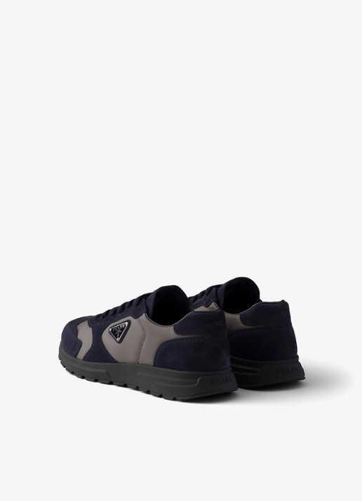 Prada Re-Nylon sneaker met suède details - achterkant donkerblauw