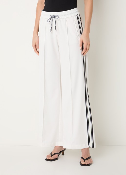 Rosner Studio Mid waist flared fit trackpants met paspelzakken