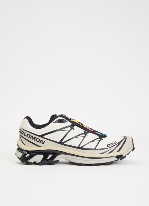 Salomon XT-6 sneaker met details van mesh - voorkant vanillegeel