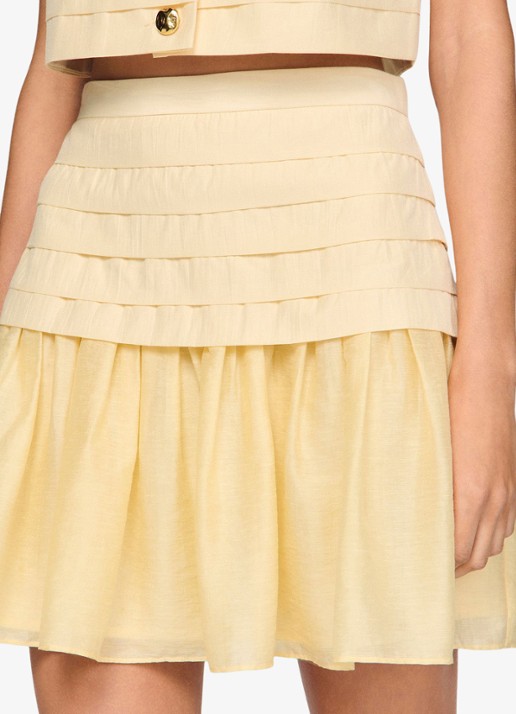 Sandro Mini rok met plooien - detail 3 vanilla / geel