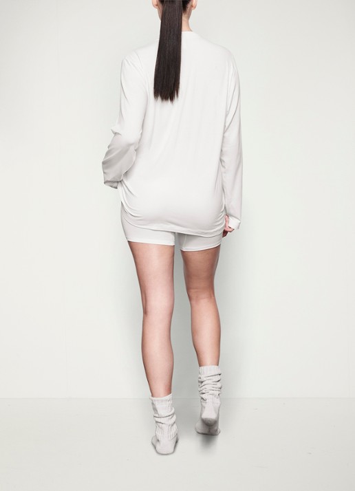 SKIMS Boyfriend oversized loungetop met stretch - achterkant gebroken wit